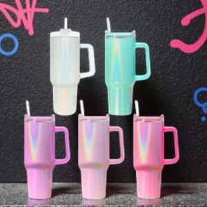 Six pastel-colored water bottles with handles and straws arranged in two rows against a dark chalkboard background.