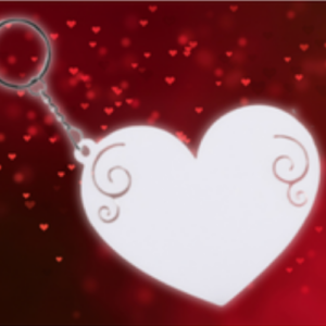 White heart-shaped pendant on a silver keyring, set against a red, heart-filled background.