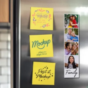 Three yellow sticky notes with decorative text on a stainless steel refrigerator, placed next to a vertical photo strip of a smiling family labeled 'Family'